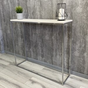 Напольная консоль Akur Loft Wington 1200 металлокаркас хромированный декор белый, Loft Wington 1200 металлокаркас хромированный декор белый
Напольная консоль Akur Loft Wington 1200 металлокаркас хромированный декор белый, Loft Wington 1200 металлокаркас хромированный декор белый