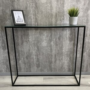 

Напольная консоль Akur Loft Norman 1200 металлокаркас черный прозрачное стекло, Loft Norman 1200 металлокаркас черный прозрачное стекло