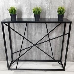 

Напольная консоль Akur Loft Paterson 1200 металлокаркас черный тонированное стекло, Loft Paterson 1200 металлокаркас черный тонированное стекло